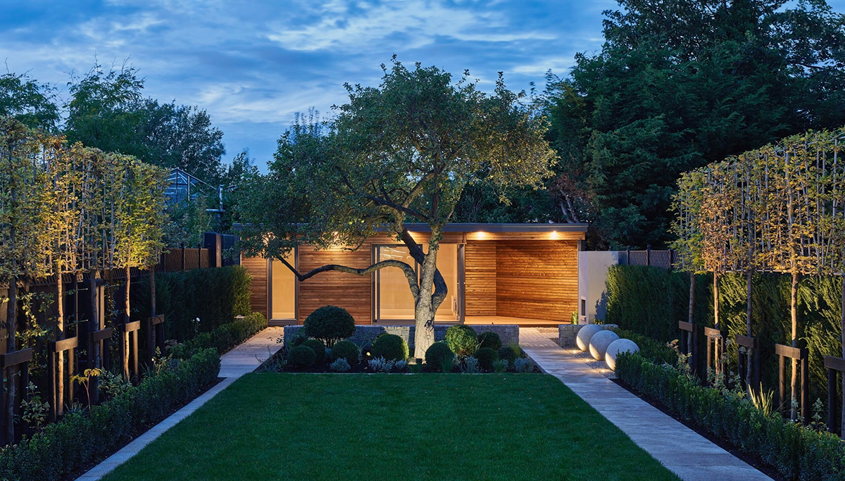 A Shomera garden studio in an autumn garden